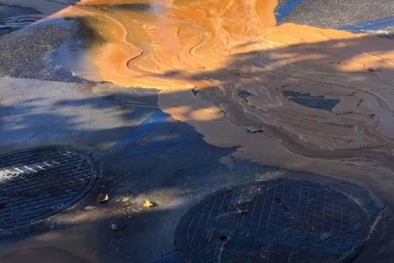 Full grease trap being professionally cleaned in Garden Grove restaurant