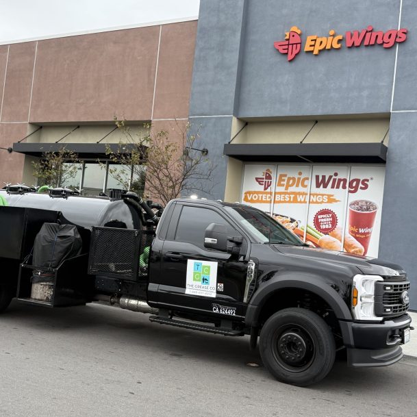 tustin Grease trap cleaning truck standing outside a restaurant in Tustin